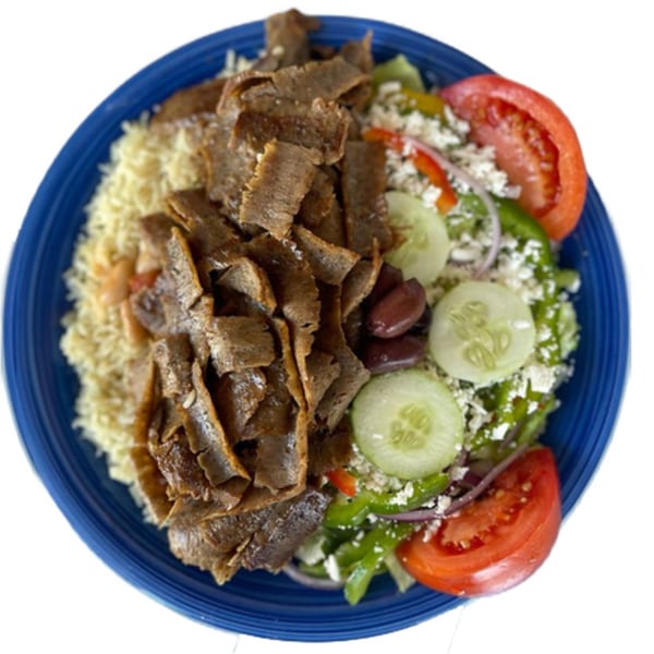 A blue plate holds a Greek gyro platter with meat, rice, salad, tomatoes, cucumbers, and olives.